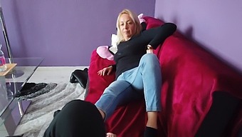 A Blonde Woman Receives Her First Foot Massage And Worship Session